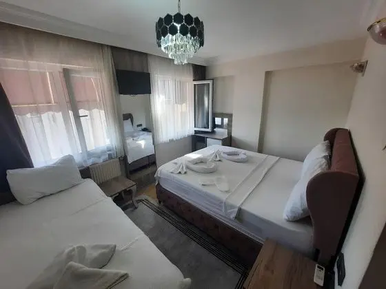 Üç Kişilik Oda