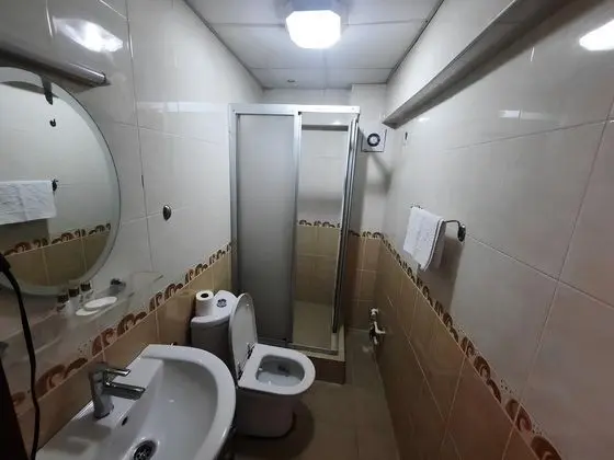 Üç Kişilik Oda