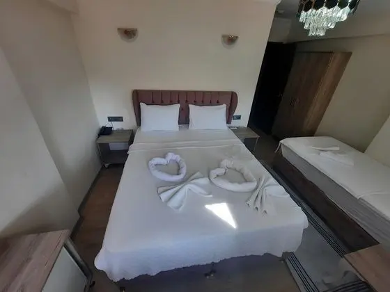 Üç Kişilik Oda