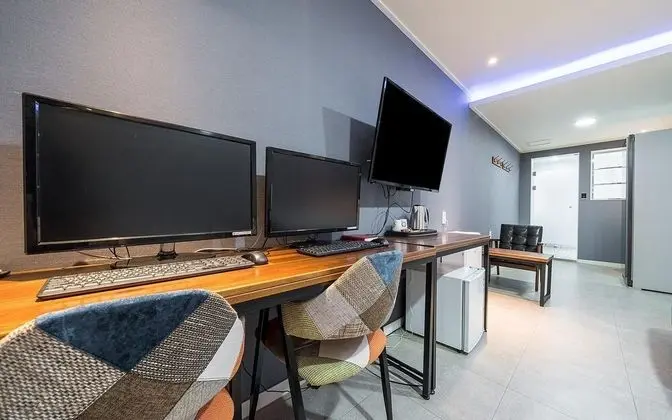 Oda (Deluxe room twin (double + single + s)