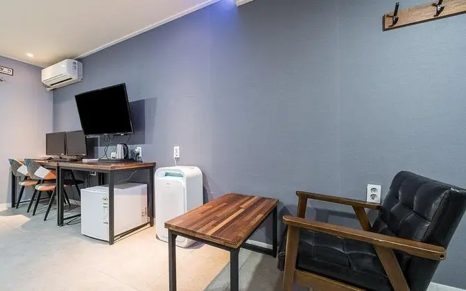 Oda (Deluxe room twin (double + single + s)