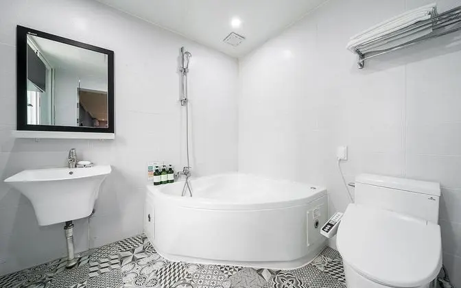 Oda (Deluxe room twin (double + single + s)