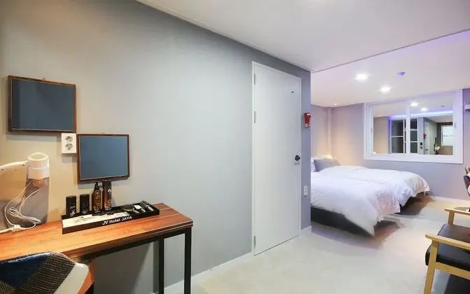 Oda (Deluxe room twin (double + single + s)