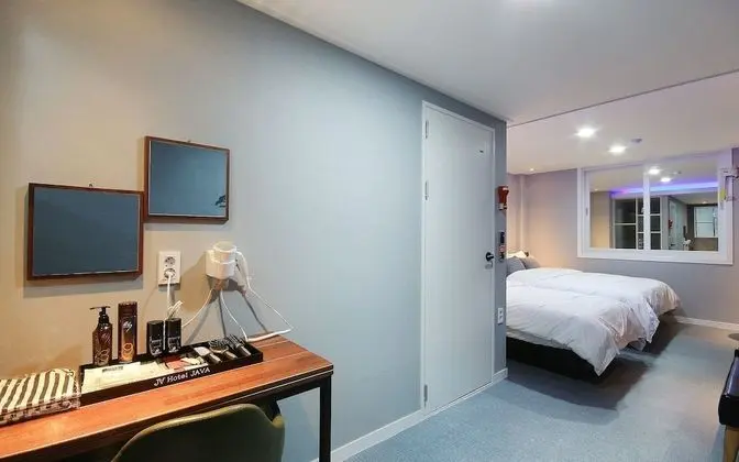 Oda (Deluxe room twin (double + single + s)