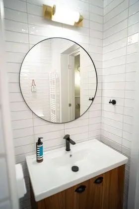 Beige and Blanc Two Bedroom Apartment with Urban Back Yard & Free Parking