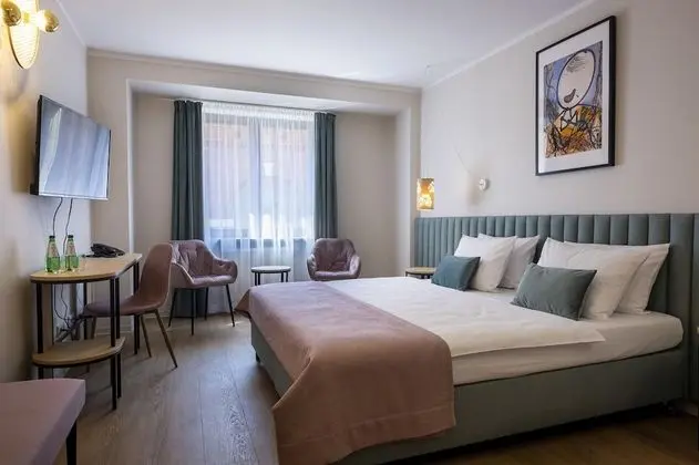 Deluxe Tek Büyük veya İki Ayrı Yataklı Oda