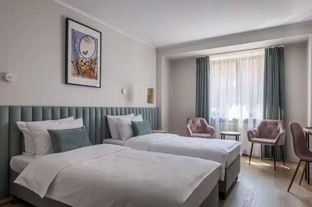 Deluxe Tek Büyük veya İki Ayrı Yataklı Oda