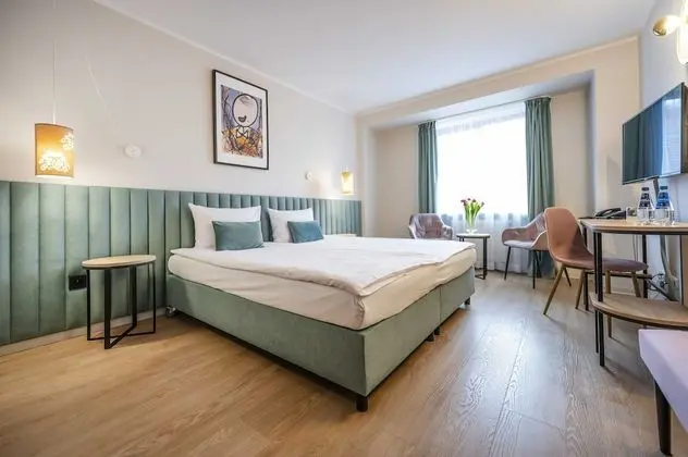 Deluxe Tek Büyük veya İki Ayrı Yataklı Oda