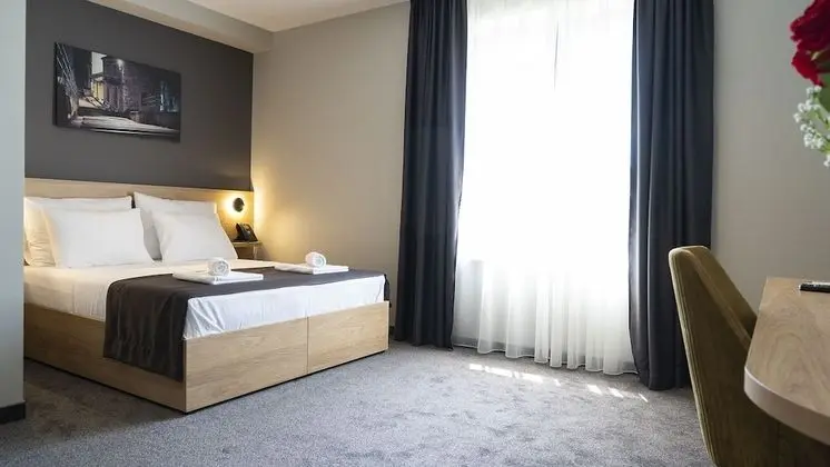 Deluxe Tek Büyük veya İki Ayrı Yataklı Oda