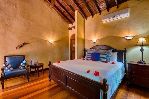 Royale Luxury King Suite with courtyard view with a private balcony