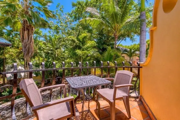Royale Luxury King Suite with courtyard view with a private balcony