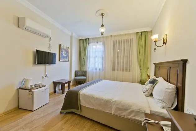 Deluxe Tek Büyük Yataklı Oda