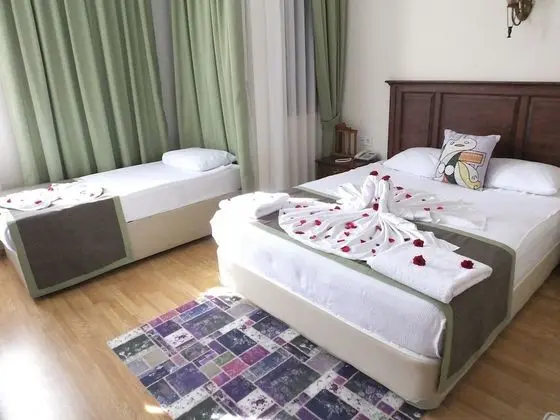 Deluxe Üç Kişilik Oda