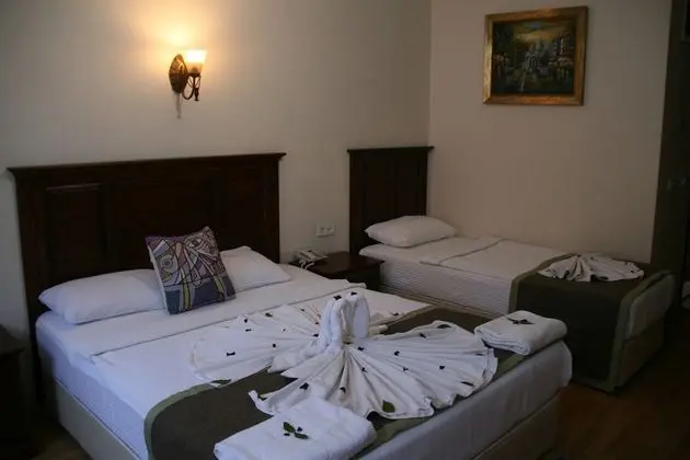 Deluxe Üç Kişilik Oda