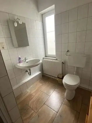 Economy Üç Kişilik Oda, Ortak Banyo