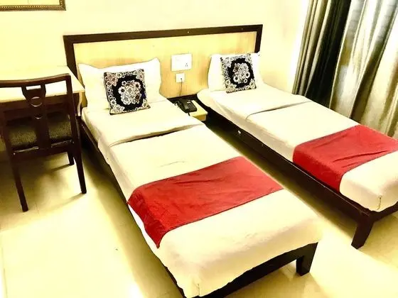 Deluxe Tek Büyük veya İki Ayrı Yataklı Oda