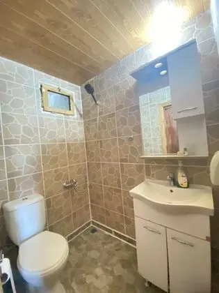 Deluxe Üç Ayrı Tek Yataklı Oda