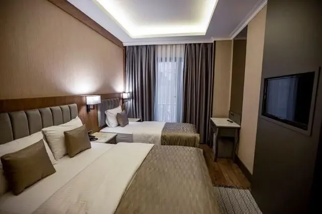 Deluxe Üç Kişilik Oda