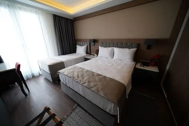 Deluxe Üç Kişilik Oda