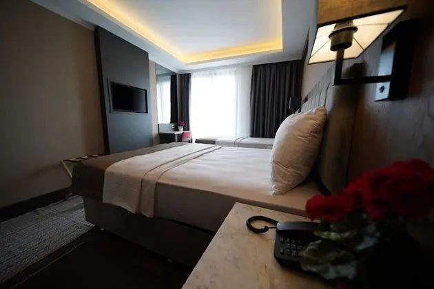 Deluxe Üç Kişilik Oda