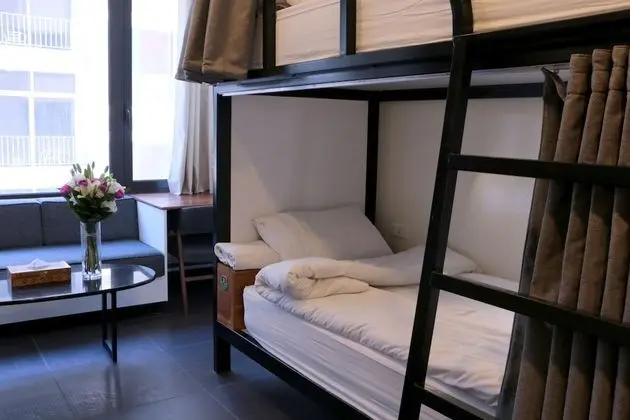 Shared Dorm (Men): 1 room: 6 single bunk beds for 6 persons, with 1 sharing bathroom