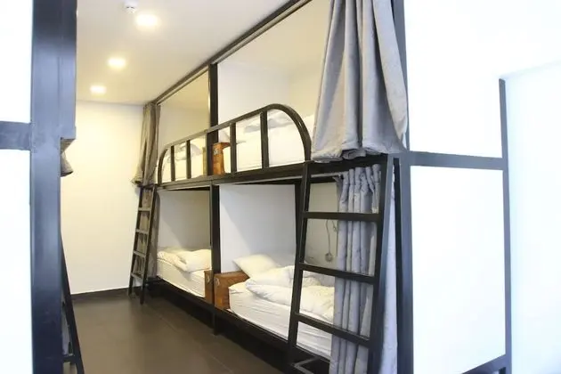 Shared Dorm (Men): 1 room: 6 single bunk beds for 6 persons, with 1 sharing bathroom