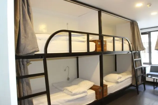 Shared Dorm (Women): 1 room: 6 single bunk beds for 6 persons, with 1 sharing bathroom