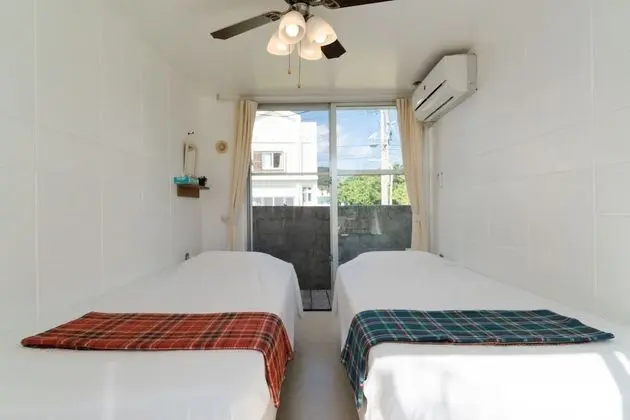 İki Ayrı Yataklı Oda, Ortak Banyo