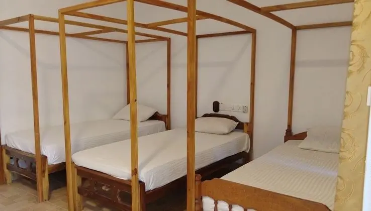 Deluxe Üç Kişilik Oda, Bahçe Manzaralı