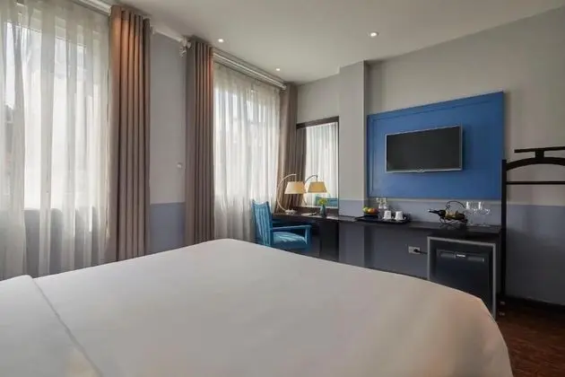 Deluxe Tek Büyük veya İki Ayrı Yataklı Oda