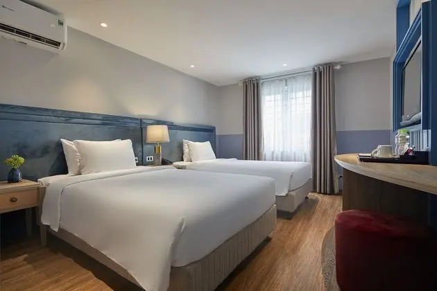 Deluxe Tek Büyük veya İki Ayrı Yataklı Oda