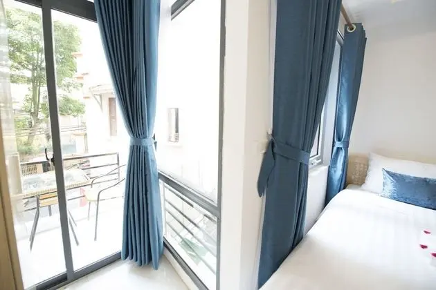 Deluxe Tek Büyük veya İki Ayrı Yataklı Oda, Balkon