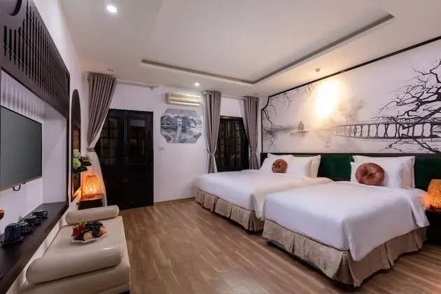 Deluxe Tek Büyük veya İki Ayrı Yataklı Oda