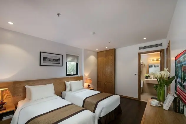 Deluxe Tek Büyük veya İki Ayrı Yataklı Oda