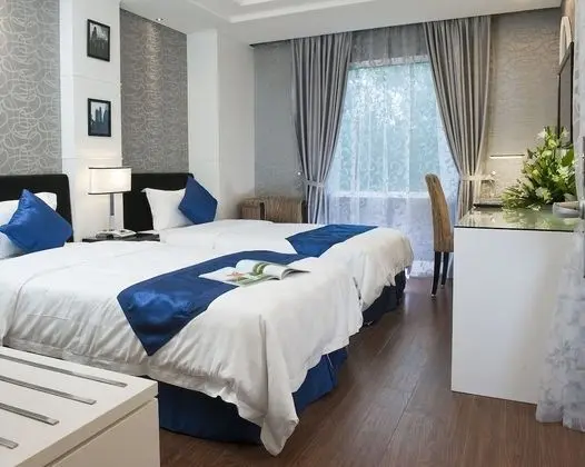 Premium Tek Büyük veya İki Ayrı Yataklı Oda