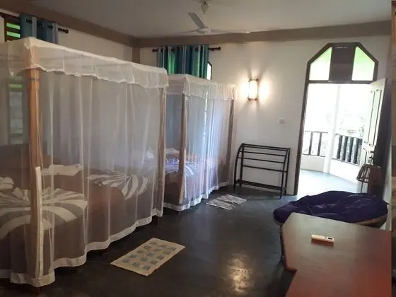 Deluxe Dört Kişilik Oda, Plaj Manzaralı