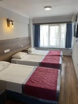 Üç Kişilik Oda