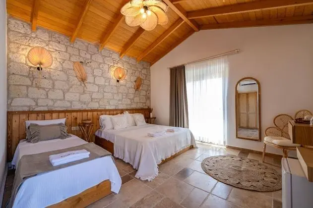 Deluxe Üç Kişilik Oda , Bahçe Manzaralı, Balkonlu
