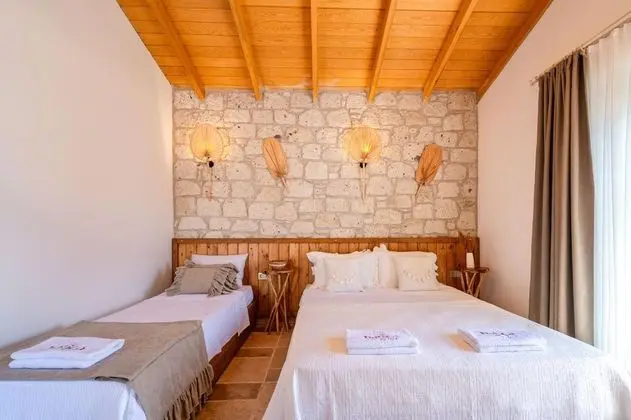 Deluxe Üç Kişilik Oda , Bahçe Manzaralı, Balkonlu