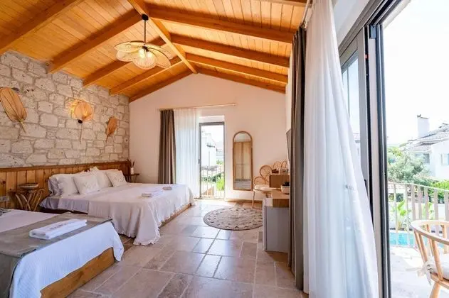 Deluxe Üç Kişilik Oda , Bahçe Manzaralı, Balkonlu