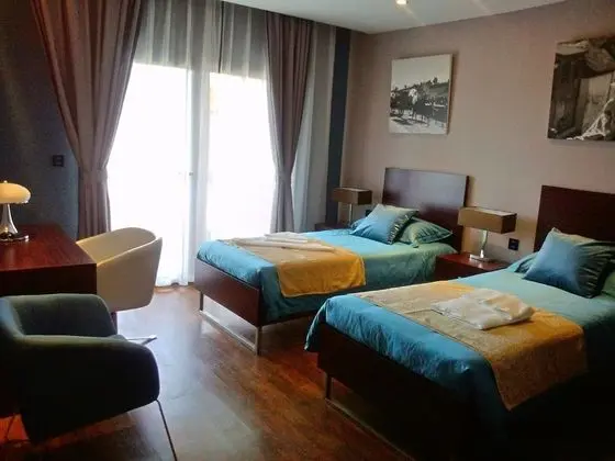 Comfort Tek Büyük veya İki Ayrı Yataklı Oda