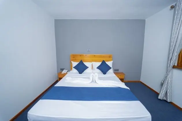 Deluxe Tek Büyük veya İki Ayrı Yataklı Oda