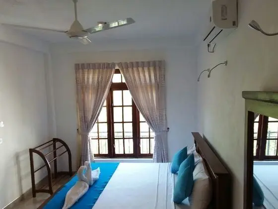 Deluxe Double Room with Balcony (AC)