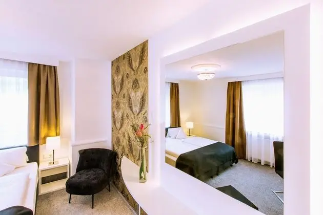 Deluxe Tek Büyük veya İki Ayrı Yataklı Oda