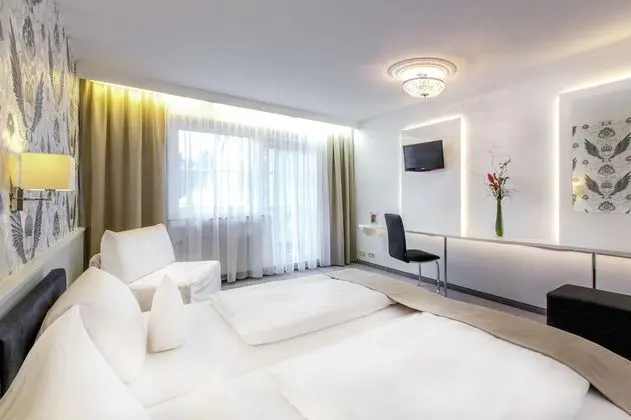 Deluxe Tek Büyük veya İki Ayrı Yataklı Oda