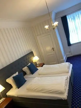 Üç Kişilik Oda
