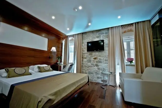 Deluxe Tek Büyük veya İki Ayrı Yataklı Oda