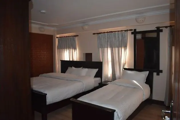 Deluxe Tek Büyük veya İki Ayrı Yataklı Oda, Avlu Manzaralı