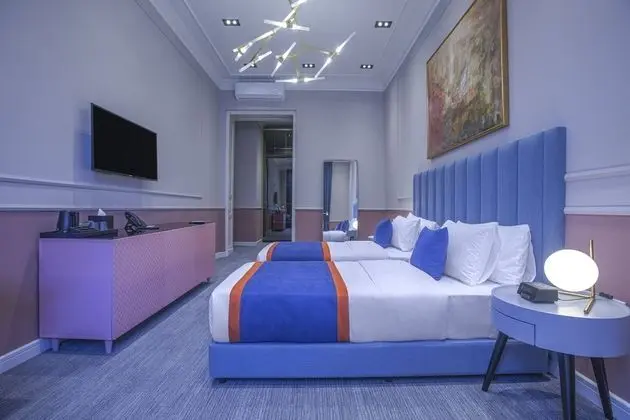 Deluxe Tek Büyük veya İki Ayrı Yataklı Oda