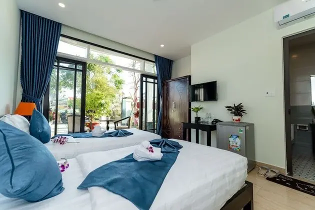 Deluxe Tek Büyük veya İki Ayrı Yataklı Oda